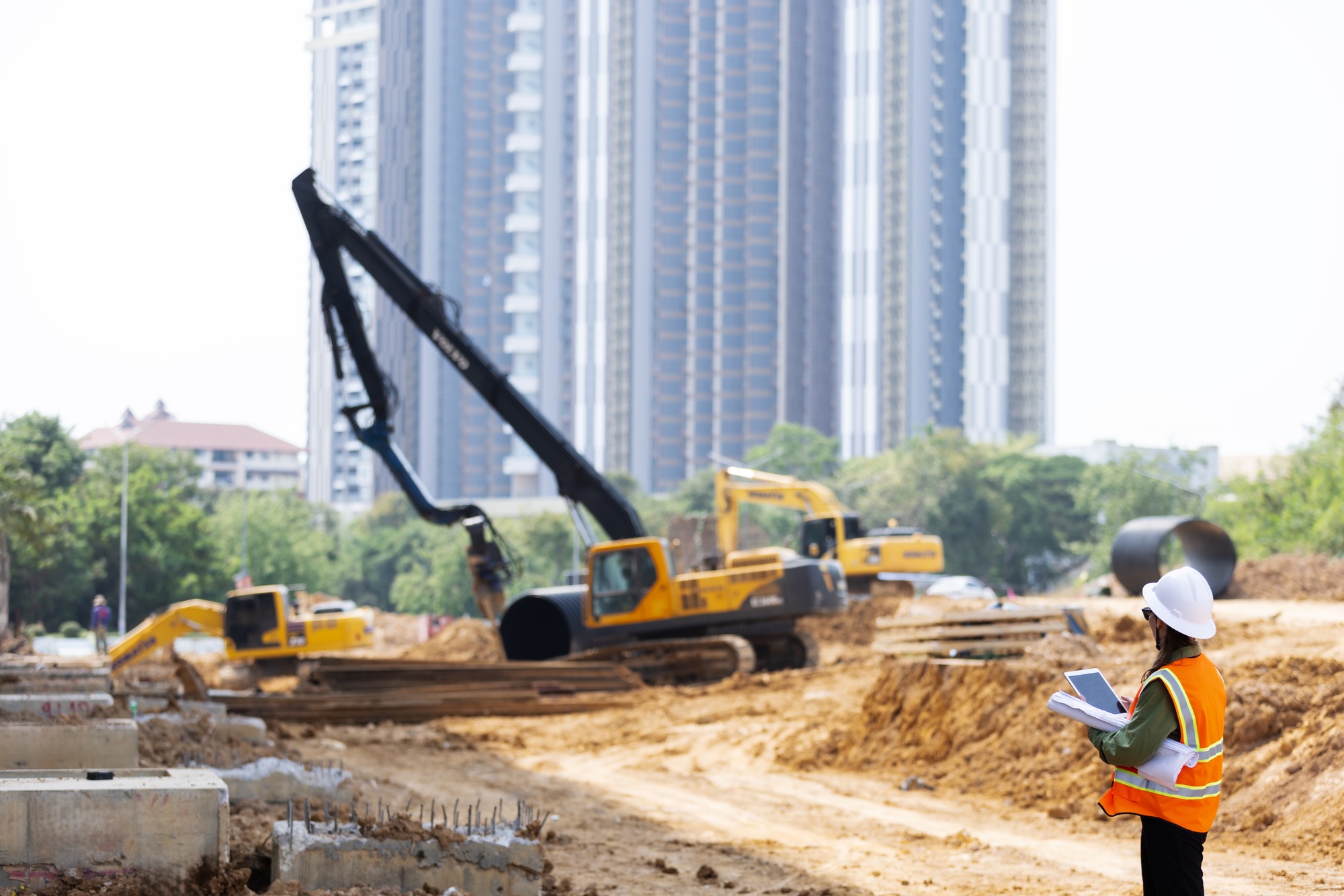 A female engineer observes a construction site
